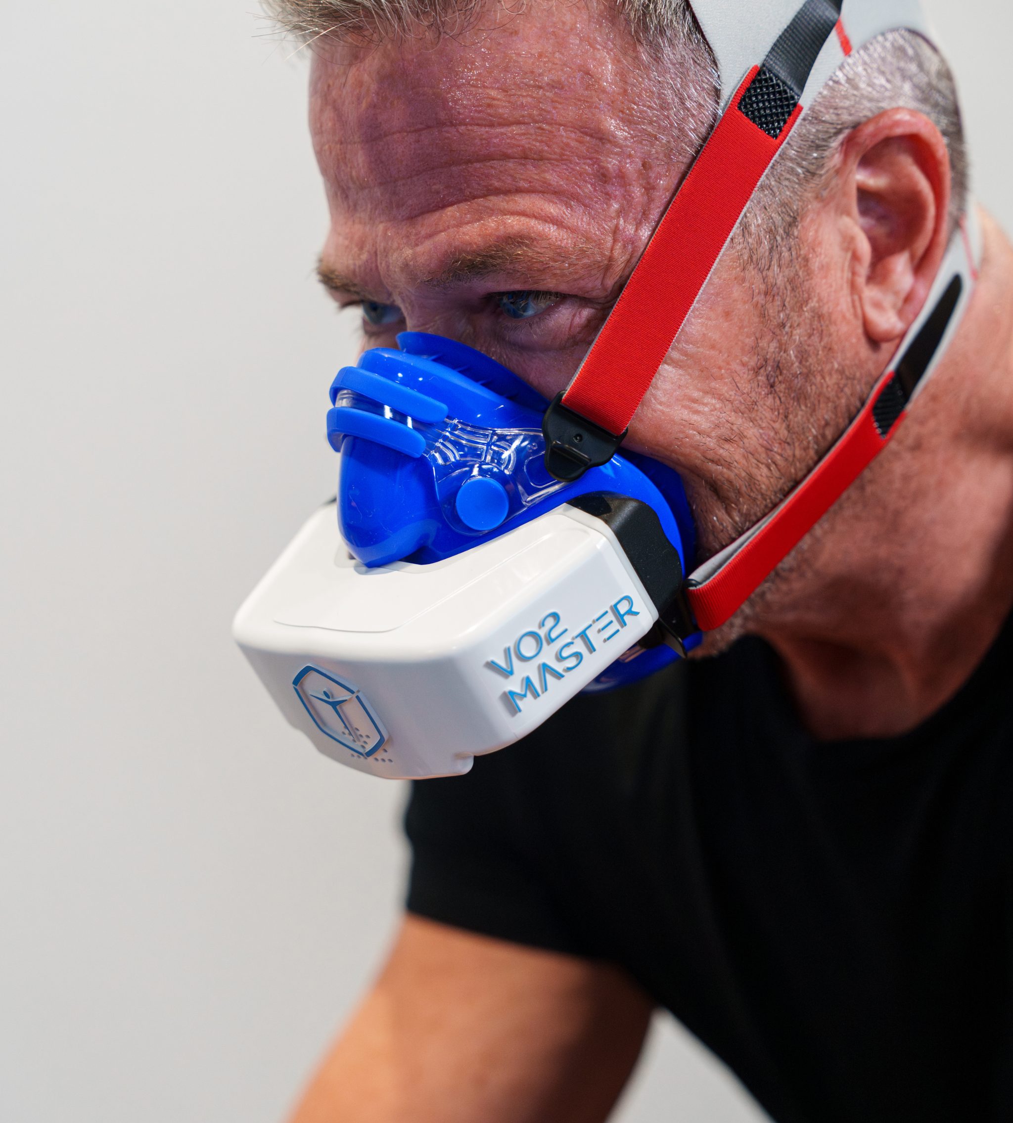 Patient wearing a VO2 Max breathing mask during testing
