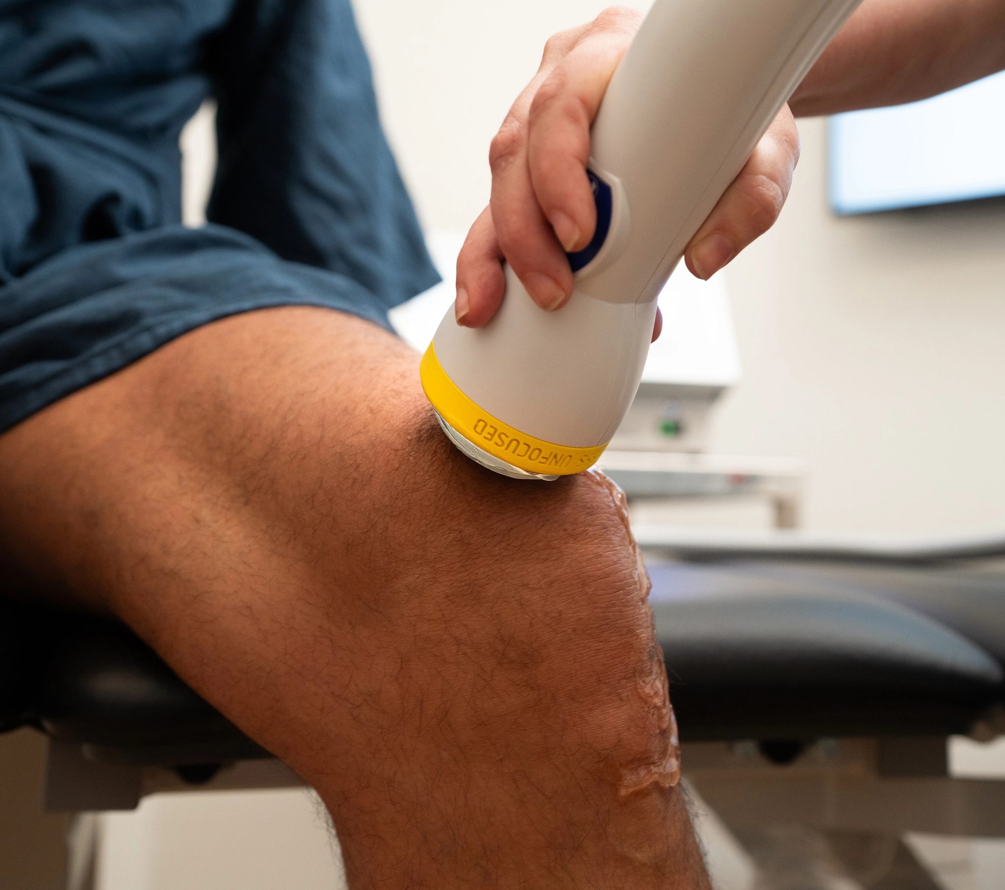 Shockwave therapy session — clinic photography