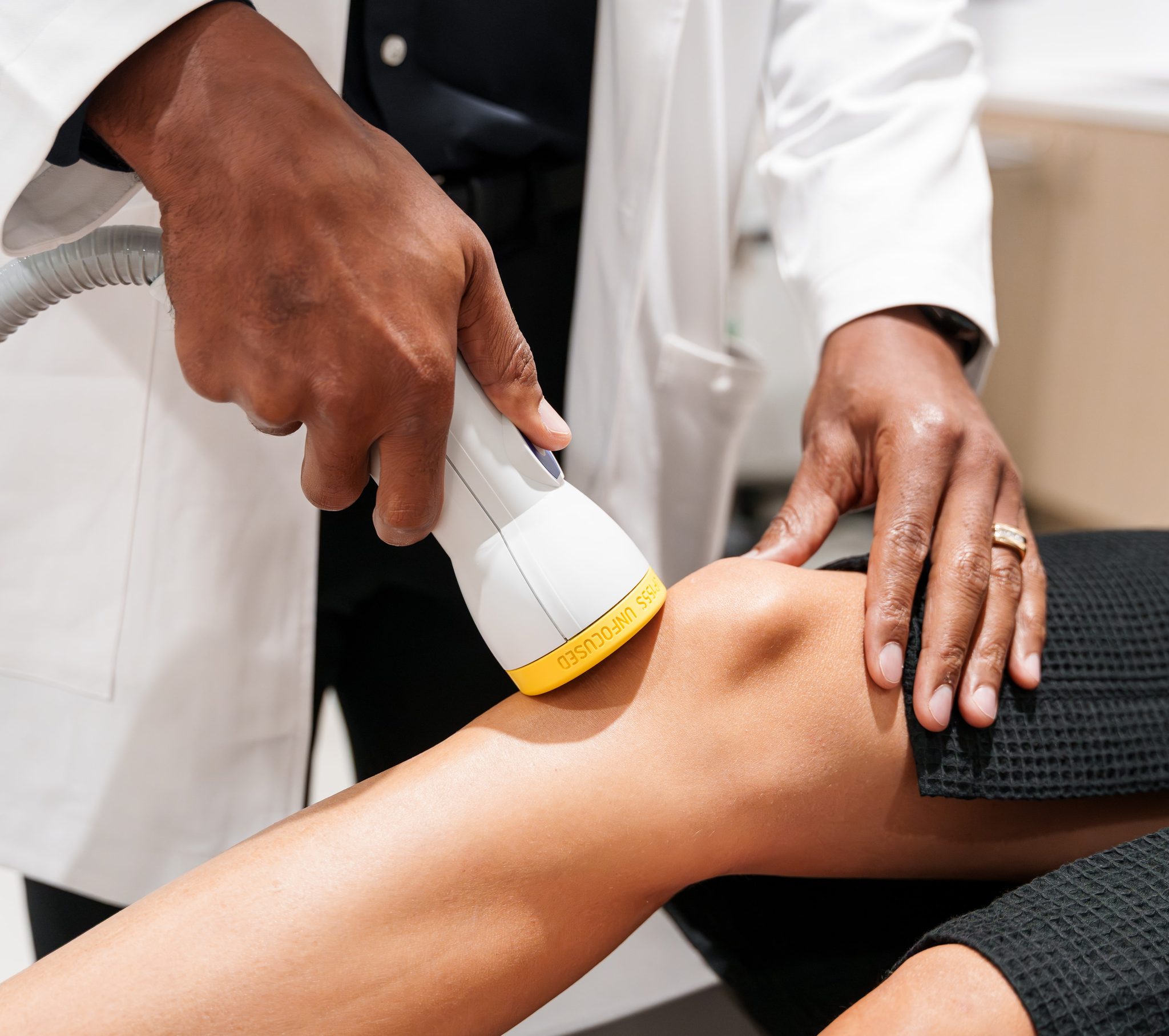 Shockwave therapy session — clinic photography